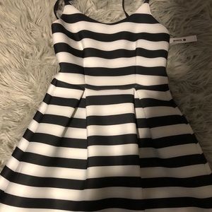 Never worn dress Aqua Bloomingdales dress!